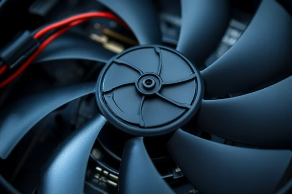 A close-up of a compact 5V DC axial fan
