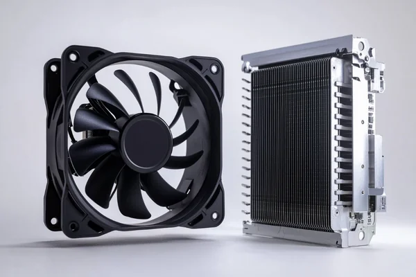 A comparison of a heatsink and a fan side-by-side