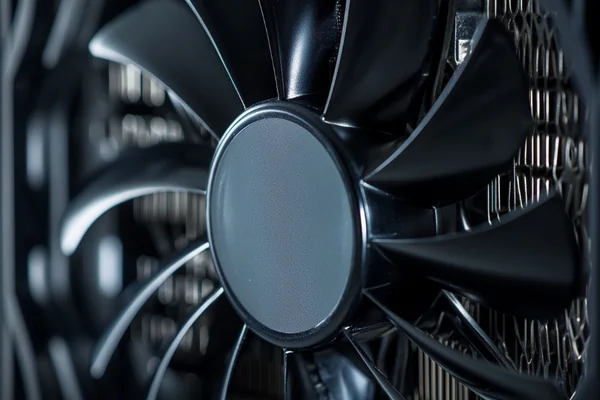 A fan pushing air into a CPU heatsink