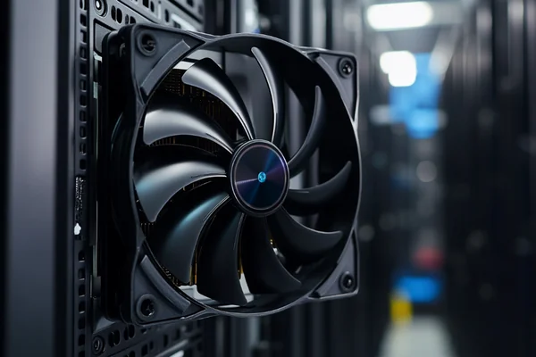 A high-speed DC axial fan spinning rapidly inside a computer server rack