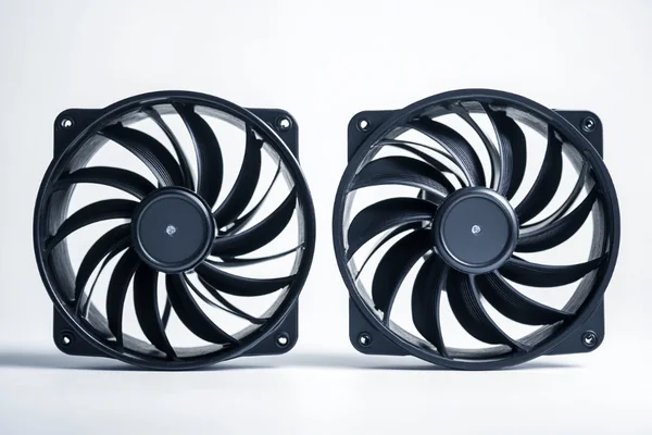 A side-by-side comparison of a DC fan and an AC fan