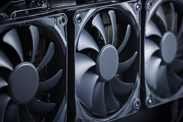 An open computer case with multiple case fans for ventilation