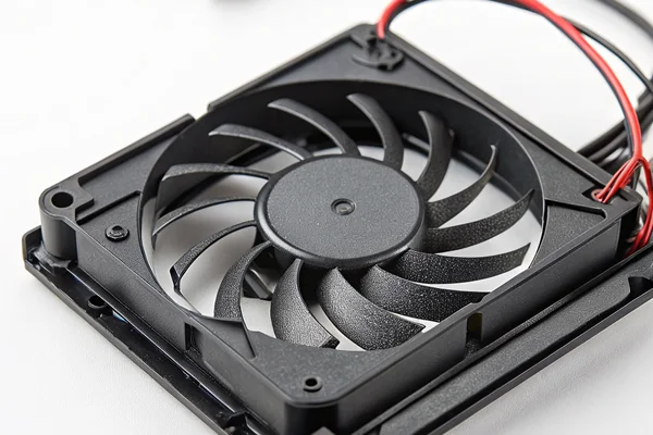 A slim 10mm DC axial fan installed inside a thin laptop cooling assembly
