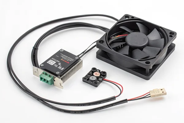 An external thermal controller with a remote temperature sensor wired to a DC axial fan