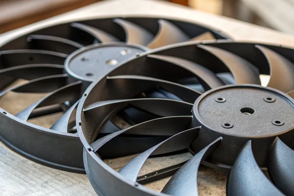 Close-up comparison of DC axial fan blades with different pitch angles